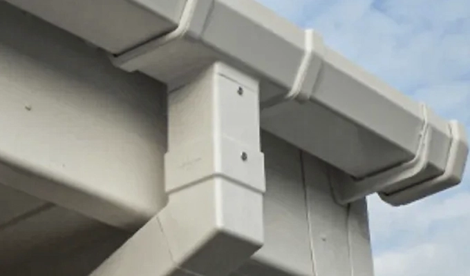 Durable UPVC roof rainwater gutter for residential buildings ensures water drainage.